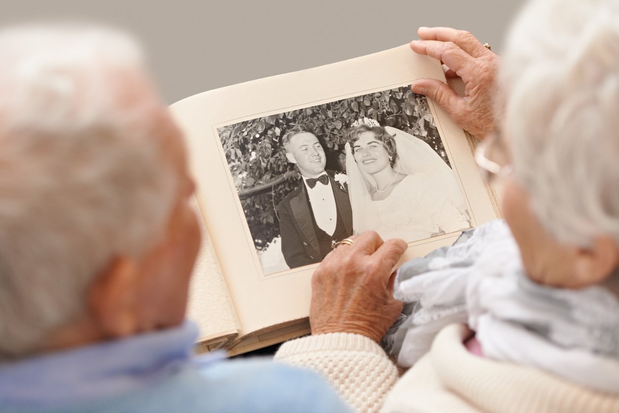 Couple Looking at Photo Album